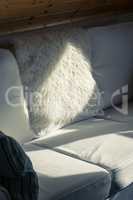 Sunbeam Falls on a White Sofa