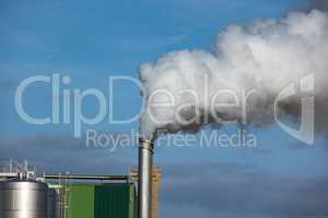 Steaming Pipe on Blue Sky Background