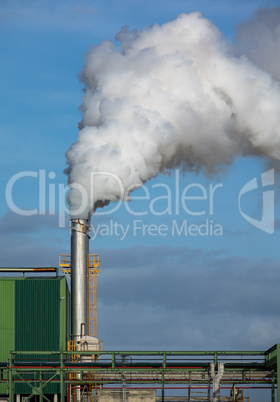 Steaming Pipe on Blue Sky Background
