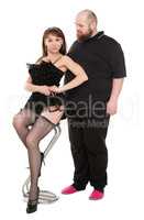 Cheerful Couple Fat man and Beautiful Woman in Lingerie