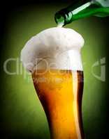 Pouring beer on green