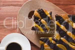 Coffee and cake with poppy seeds and orange