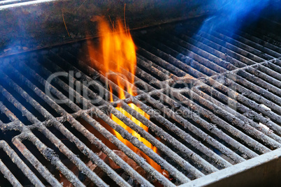BBQ Grill and glowing coals. You can see more BBQ, grilled food, fire