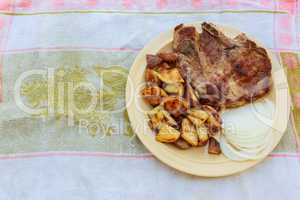 pork steak potato in village white onion