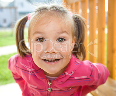 Cute little girl on playground Cute little girl on playground