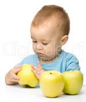 Little boy with apple