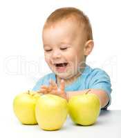 Little boy with apple