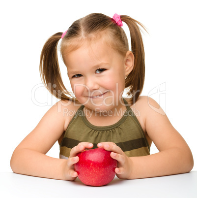 Little girl with red apple