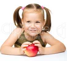 Little girl with red apple