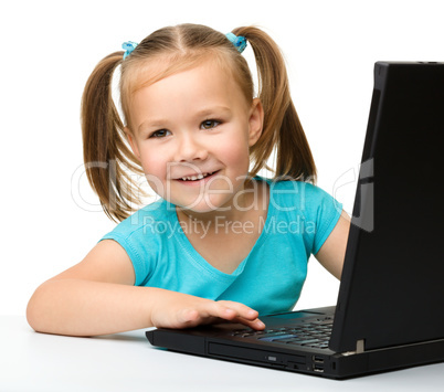 Little girl with laptop