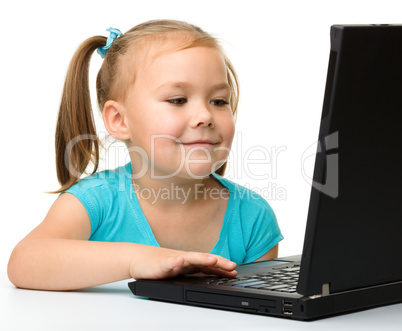 Little girl with laptop