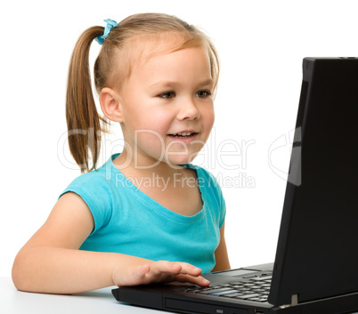 Little girl with laptop