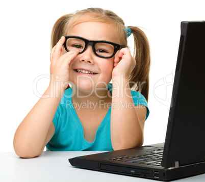 Little girl with laptop