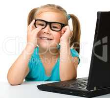 Little girl with laptop