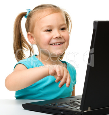 Little girl with laptop