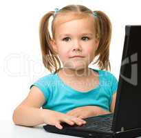 Little girl with laptop