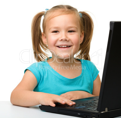 Little girl with laptop