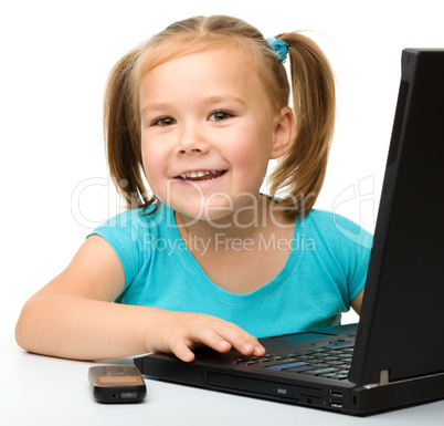 Little girl with laptop