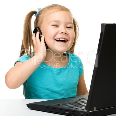 Little girl with laptop