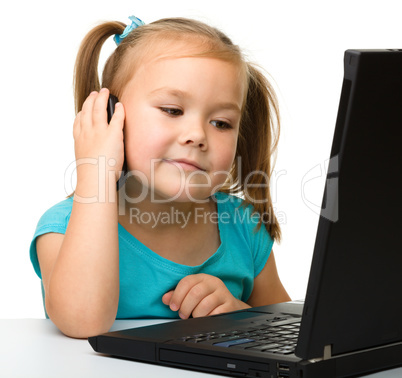 Little girl with laptop