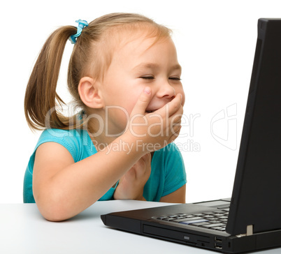 Little girl with laptop