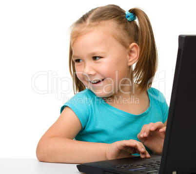 Little girl with laptop