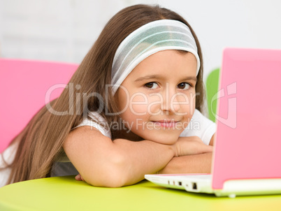 Little girl with laptop