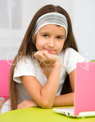 Little girl with laptop