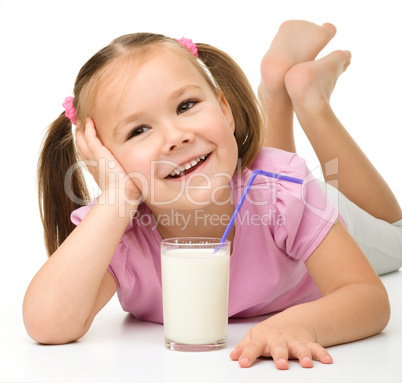 Little girl with a glass of milk