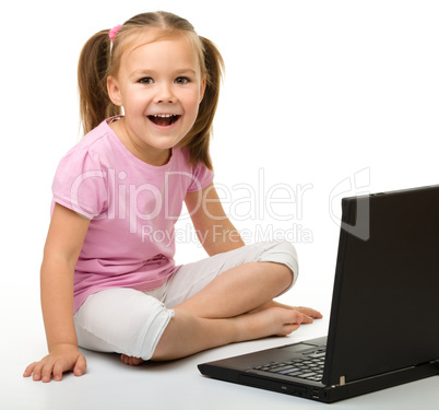 Little girl with laptop