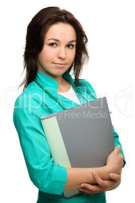 Young attractive woman wearing a doctor uniform