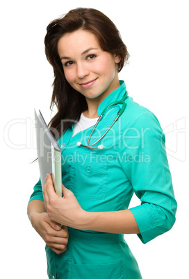 Young attractive woman wearing a doctor uniform