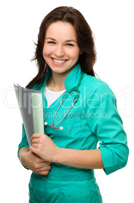 Young attractive woman wearing a doctor uniform