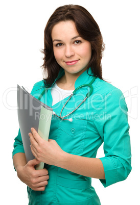 Portrait of a happy young woman doctor