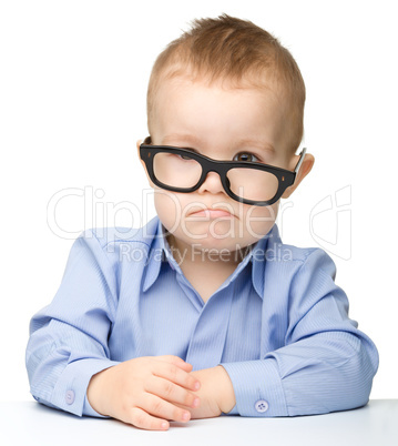 Cute little boy wearing glasses