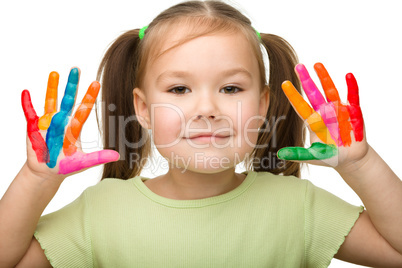 Cute cheerful girl with painted hands