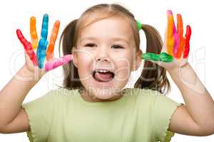 Cheerful girl with painted hands