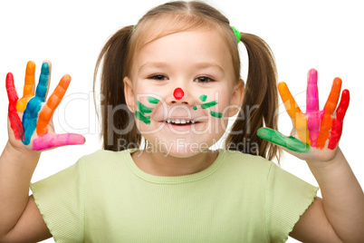 Cheerful girl with painted hands