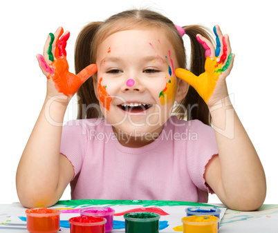 Cheerful girl with painted hands