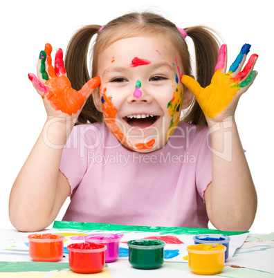 Cheerful girl with painted hands