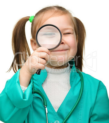 Little girl is playing doctor