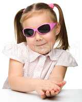 Little girl wearing sunglasses