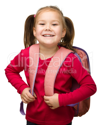 Portrait of a cute schoolgirl with backpack