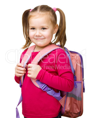 Portrait of a cute little schoolgirl with backpack