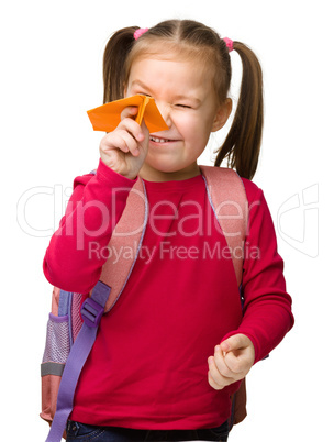 Portrait of a cute schoolgirl with backpack