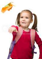 Portrait of a cute schoolgirl with backpack