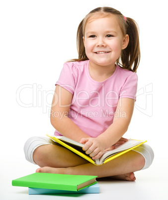Cute little girl with book Cute little girl with book