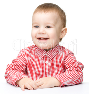 Portrait of a cute cheerful little boy