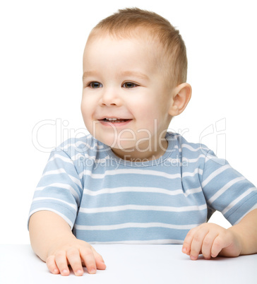 Portrait of a cute and pensive little boy