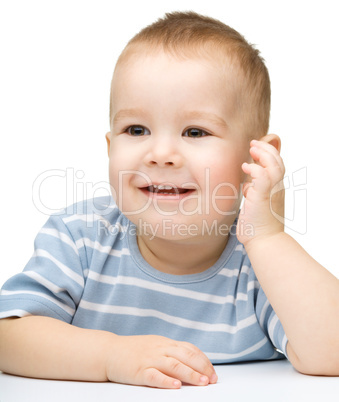 Portrait of a cute and pensive little boy